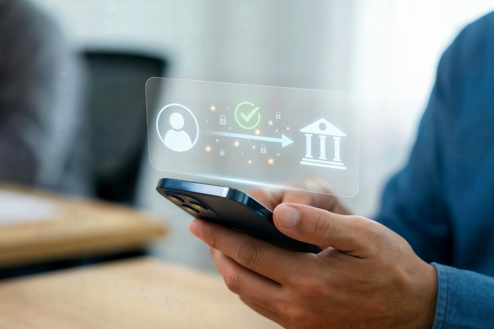 Close up of person holding mobile device processing a payment